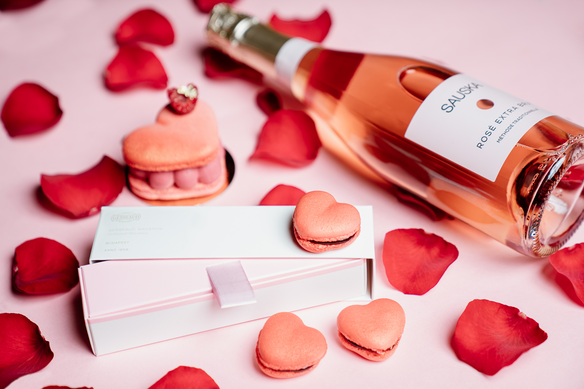 Gerbeaud's Valentine's Day offer include the Raspberry macaron dessert with one glass of Sauska sparkling wine and heart-shaped, jam-filled macaron in package